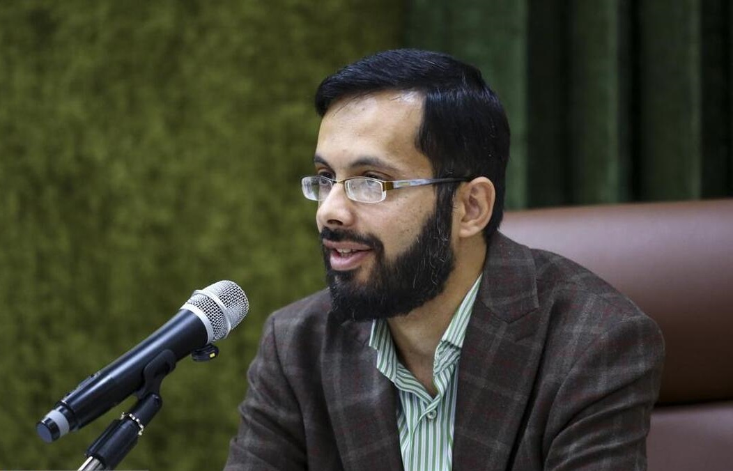 A person casts a line from the bow of a boat