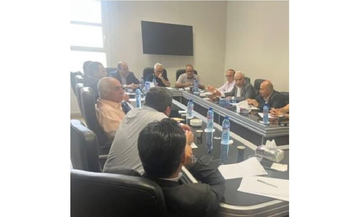 A person casts a line from the bow of a boat